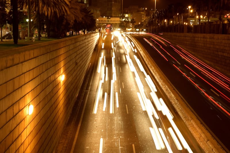 moving traffic at night with moving lights